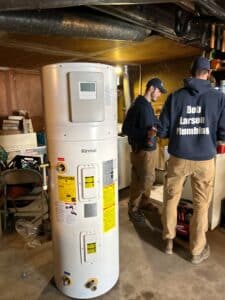 a Rinnai water heater being installed by the expert team at Bob Larson Plumbing